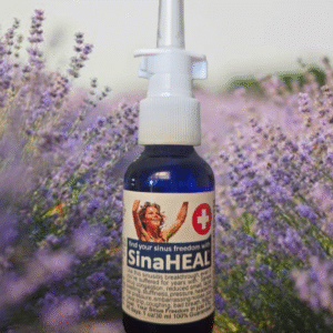 Sinaheal bottle in front of lavendar plants